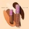 Tarte Shape Tape concealer travel and full-size tubes on foundation swatches