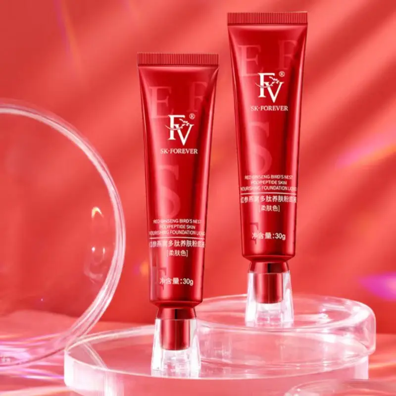 Two SK-Forever foundation tubes on a red-glass display